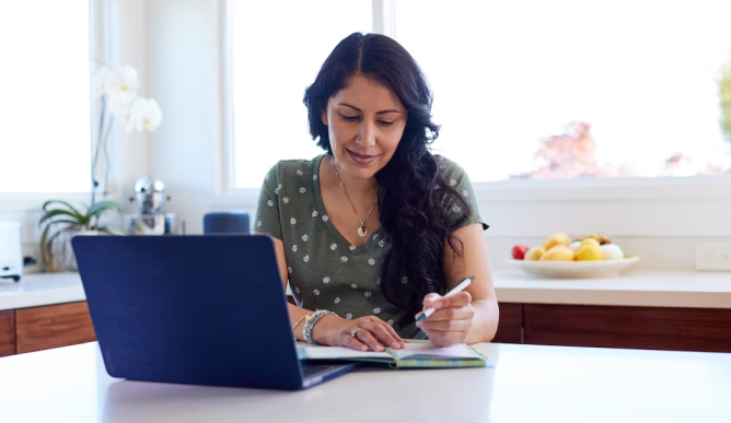 Woman working on laptop